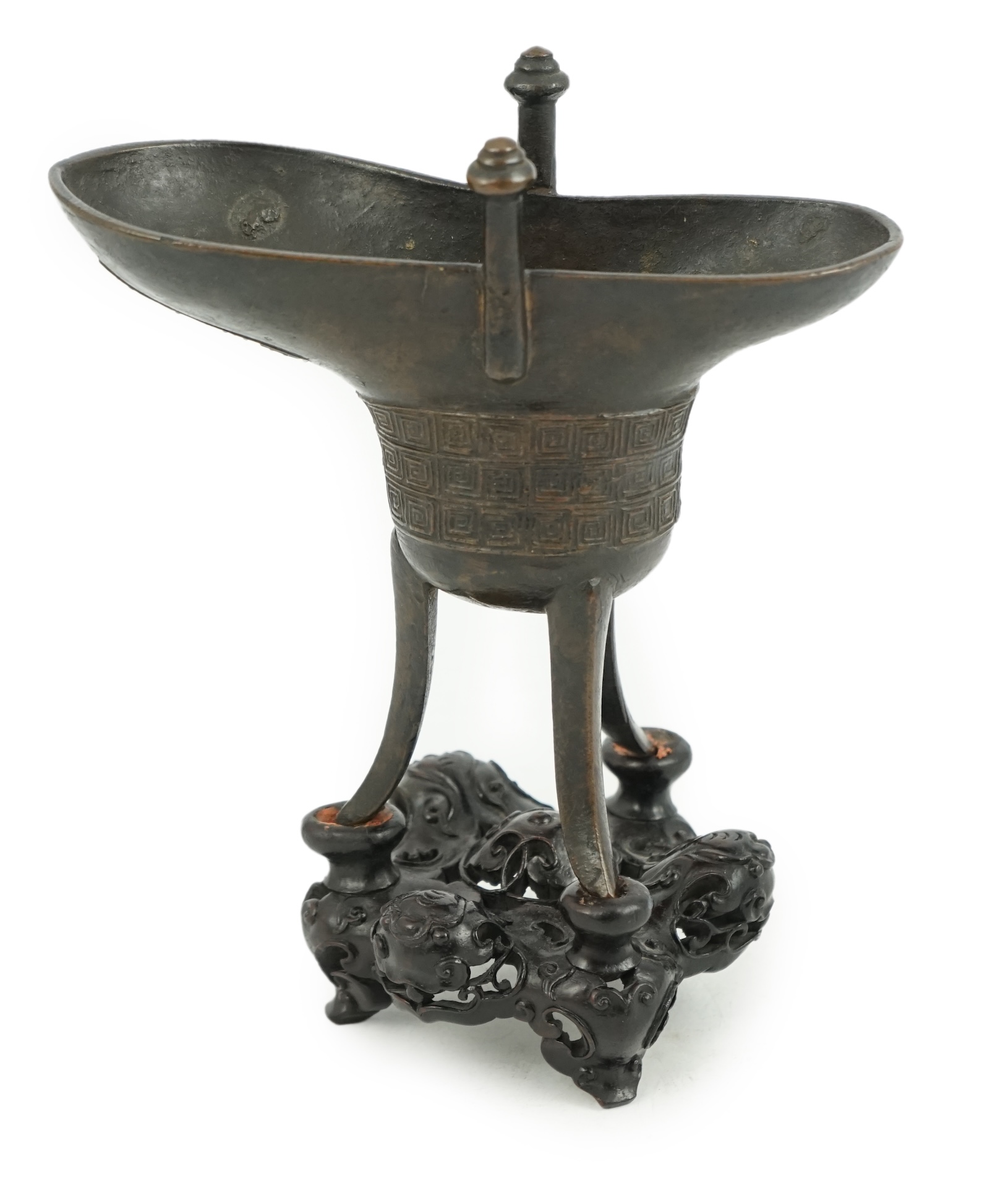 A good Chinese archaistic bronze tripod wine cup, jue, dated Qianlong 3rd year, corresponding to 1738